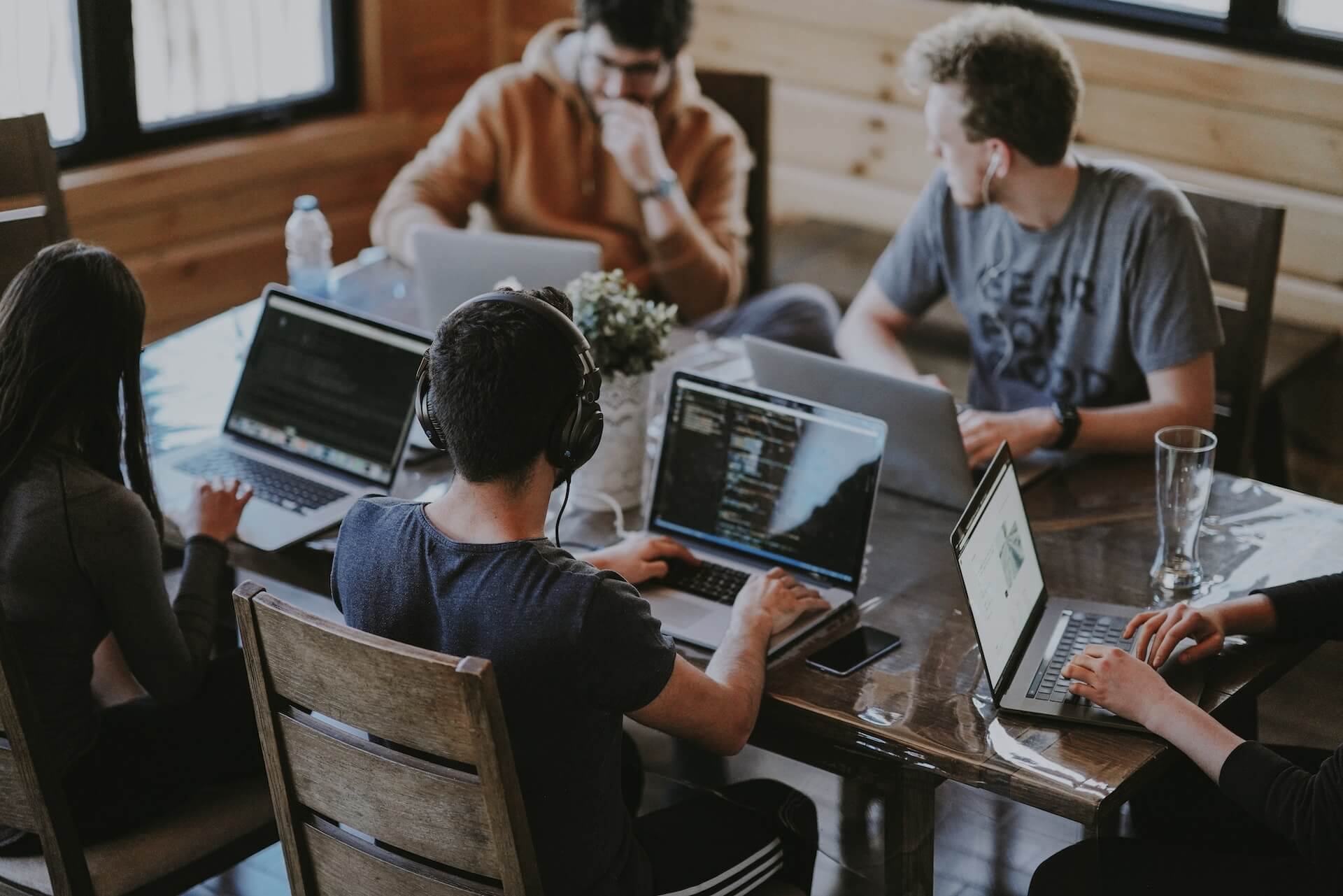 picture of a group of people on computers working